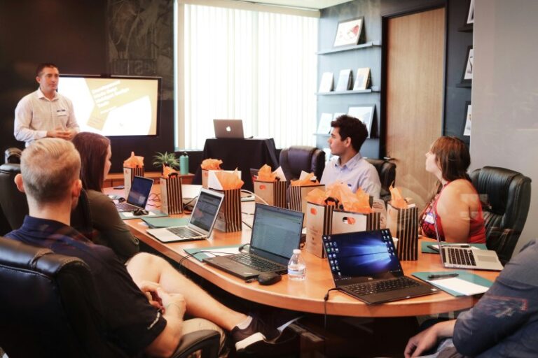 Business leader guiding a team during a strategic planning meeting.